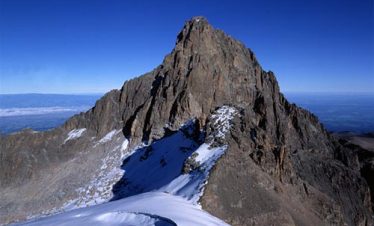 The snow-cap of Mount Kenya and the chogoria trekking route